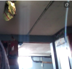 Three vertical beams from rear window, bulb covered